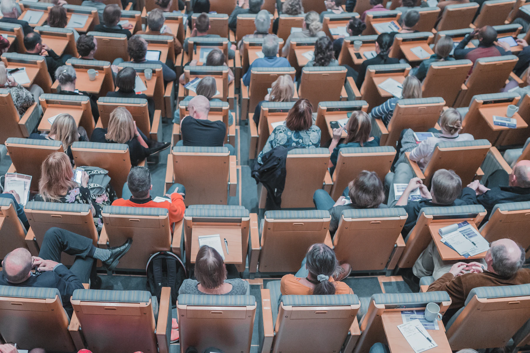 Audience seated in an auditorium